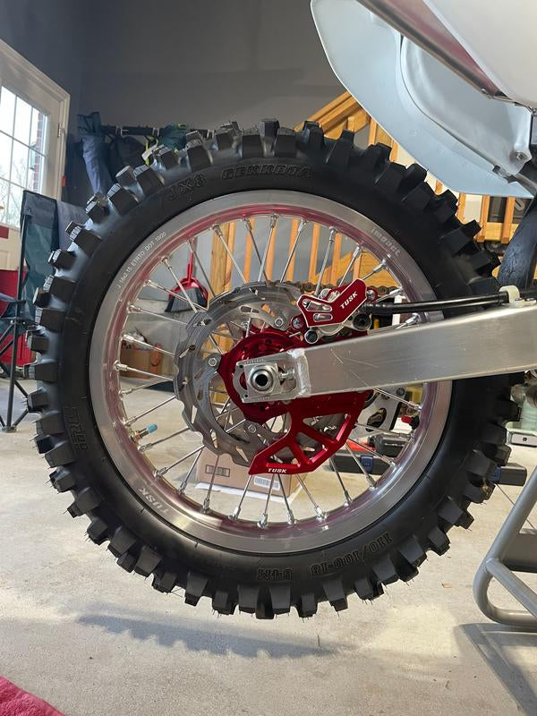 150R TUSK BILLET REAR CALIPER GUARD